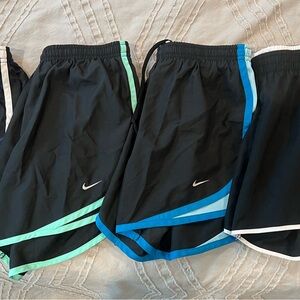 Nike running shorts. Set of 4. Various colors.